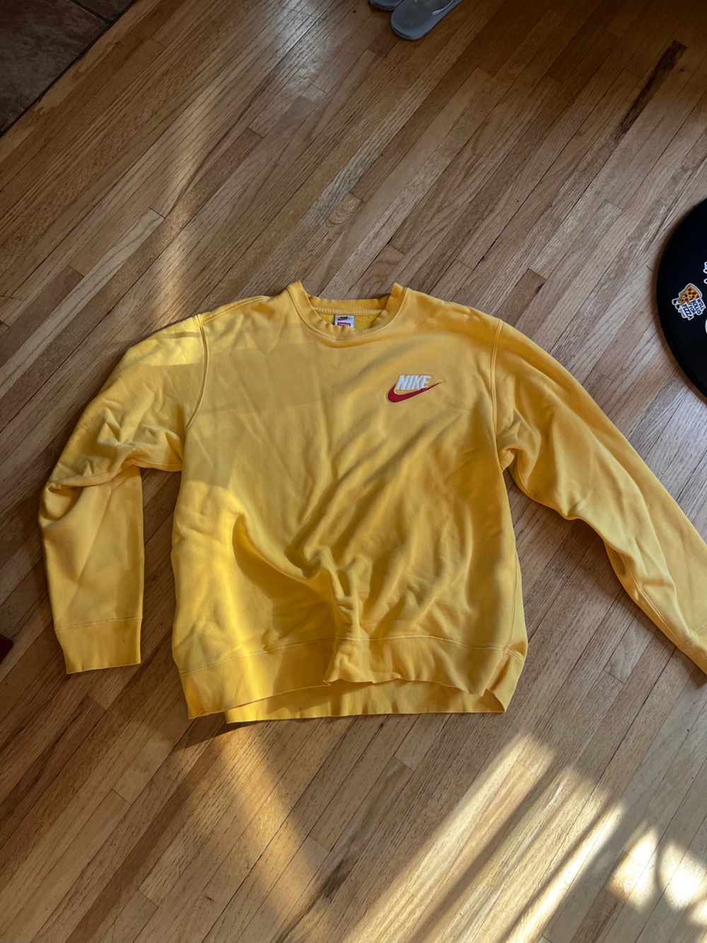 Supreme Yellow Crewneck Sweatshirt with Red Nike Swoosh